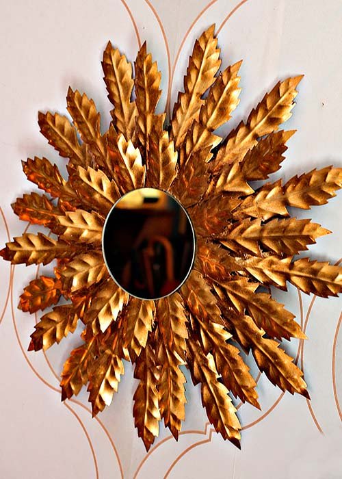 Impresionante espejo sol dorado